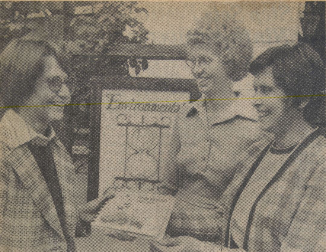 1976: Environmental Trip Tips presented to Deborah Botch of the YWCA by ECOS President Beverly Kingsley and ECOS Director Claire Schmitt.